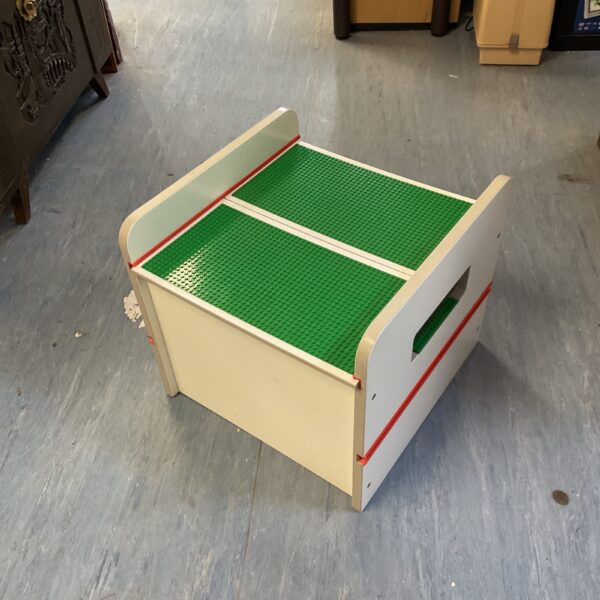 Green Lego storage box for building blocks and toys.
