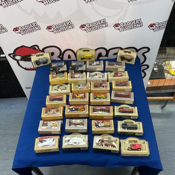 Large collection of Lledo Days Gone diecast cars and vans.