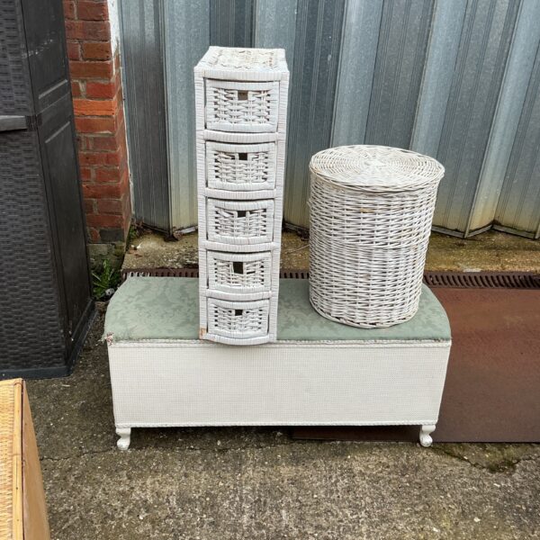 Vintage Lloyd Loom storage box with two raffia boxes for home organisation.