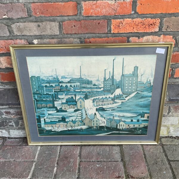 Framed LS Lowry style industrial landscape print with factory buildings.