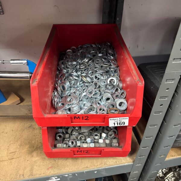 Red tray filled with M12 nuts and washers for hardware projects.