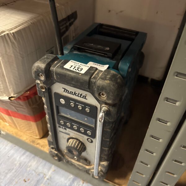 Makita site radio body, robust construction for jobsite use.