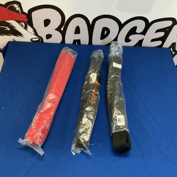 Lot of three used martial arts belts for training.