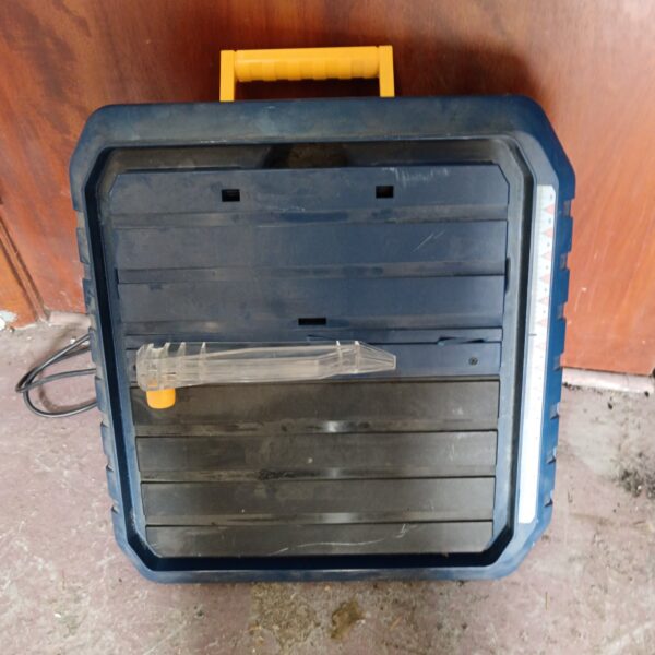 McAllister wet tile saw for cutting tiles, showing the water reservoir.