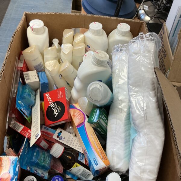 Medical cabinet lot featuring Dove Moisture cream bottles and healthcare supplies.