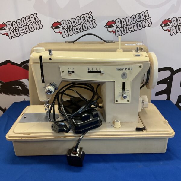 Vintage Merritt electric sewing machine with foot pedal.