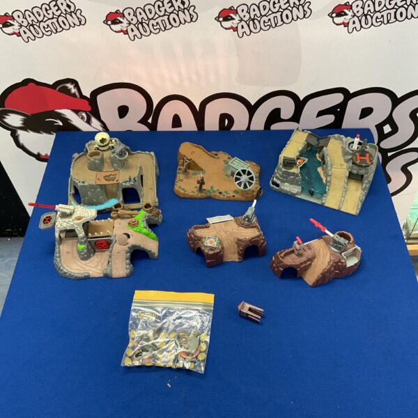 Vintage Micro Machines playset diorama with miniature terrain.