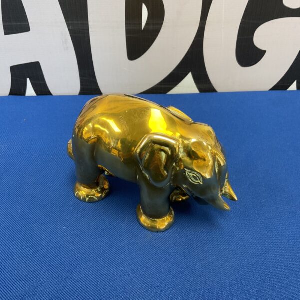 Vintage mid-century brass Burmese elephant sculpture for collectors.