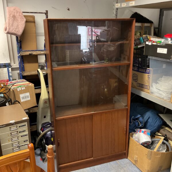 Vintage mid century modern walnut display case with glass front.
