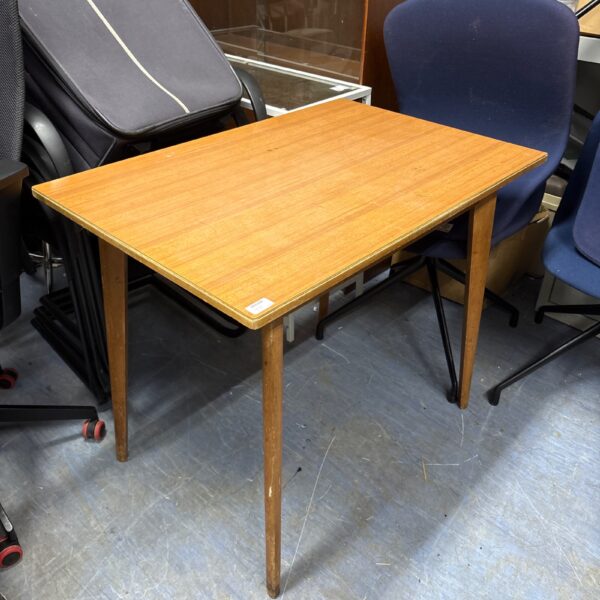 Vintage mid-century melamine table with wood-grain effect top.