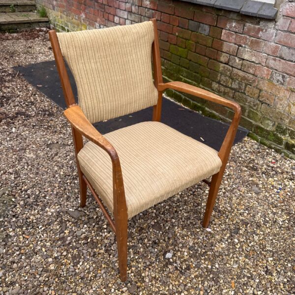 Vintage mid century Scandinavian chair with wood frame and upholstered seat.