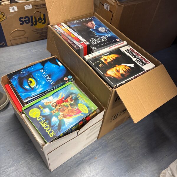 Mixed DVD lot in two cardboard boxes, assorted films.