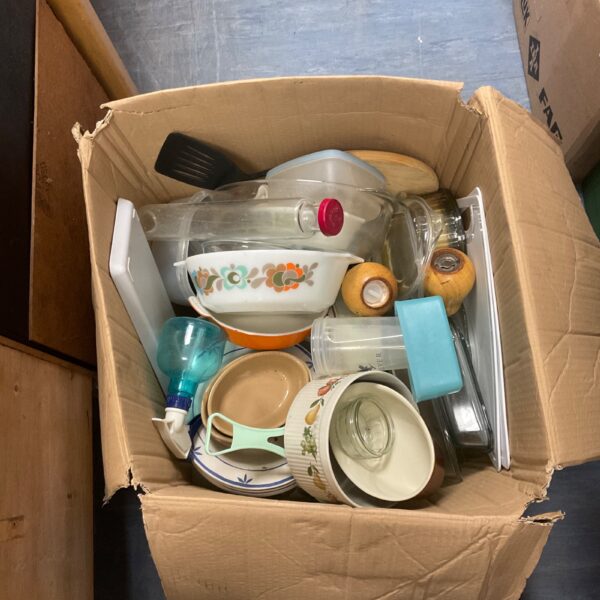 Mixed kitchenware lot with glass bowls and plates.