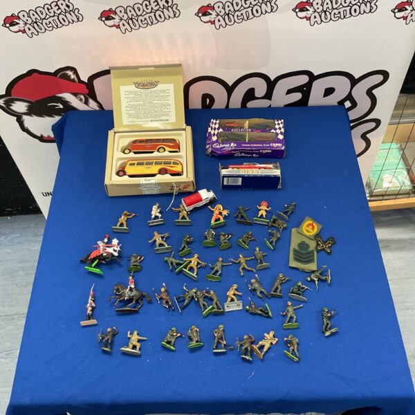 Mixed lot of vintage army figures and diecast vehicles for collectors.