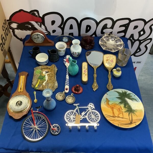 Vintage mixed lot of collectibles including a barometer and plates.