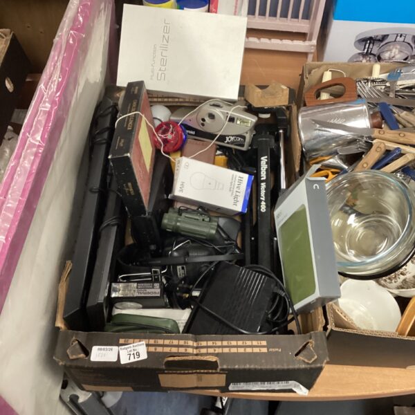 Mixed lot of electronics including an e-reader and other devices.