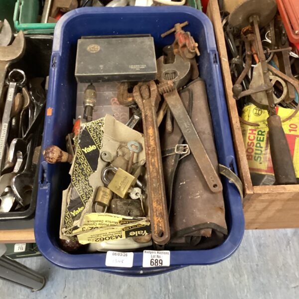 Blue tub filled with a mixed lot of hand tools and wrenches.