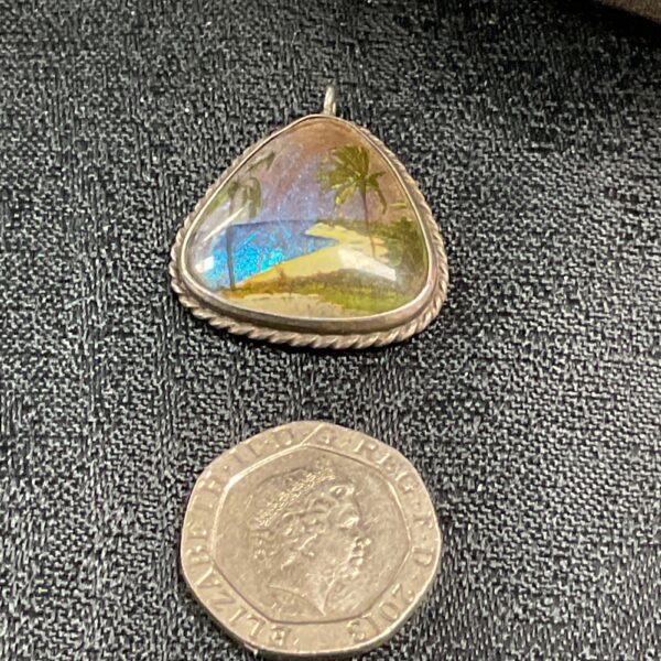 Vintage Art Deco sterling silver pendant with Morpho butterfly wing.