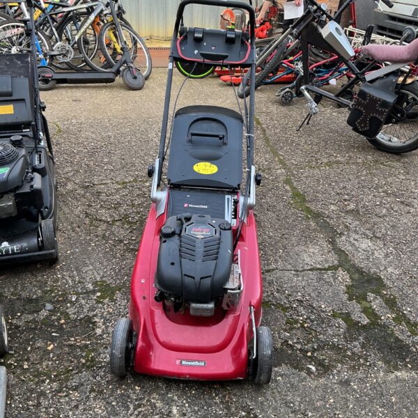 Red Mountfield M5 petrol mower for garden lawn care.