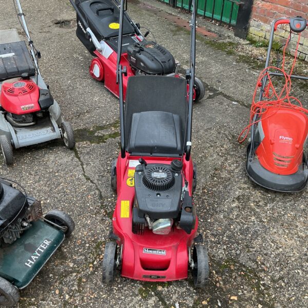 Red Mountfield R/S 100 petrol lawnmower in used condition.
