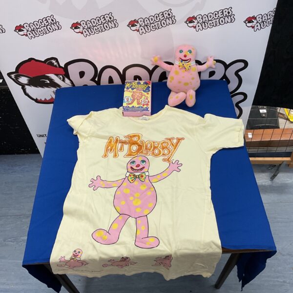 Mr Blobby lot including soft toy, t-shirt, and VHS tape.