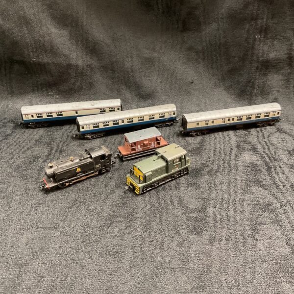 N Gauge electric train set overview with engines and carriages.