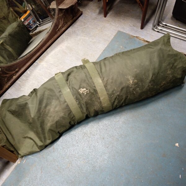 Green Nash Double Top fishing bivvy rolled up.