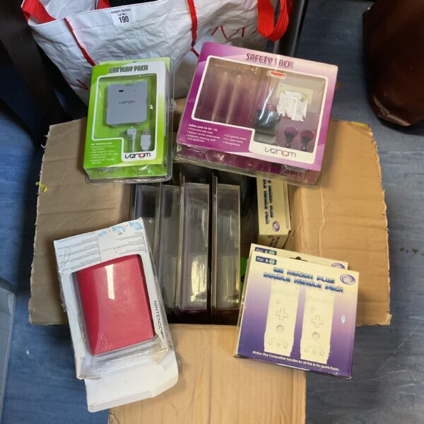 New old stock Nintendo DS accessories lot, including a protective case.