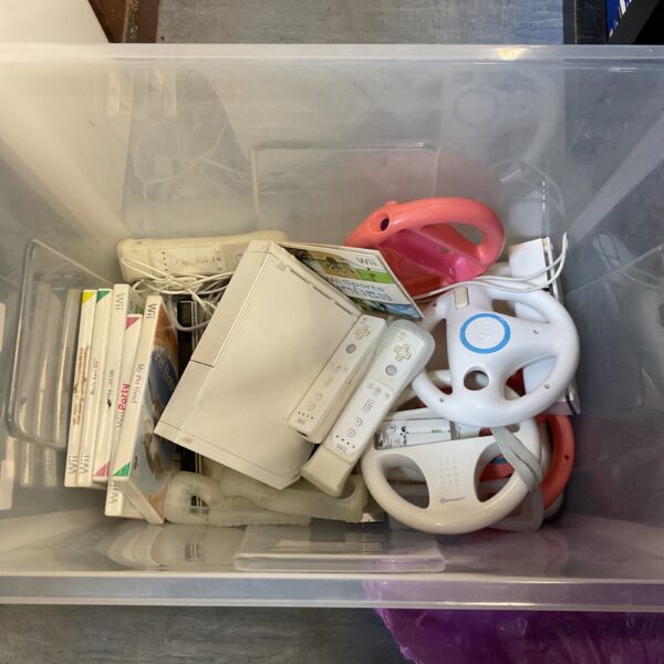 Nintendo Wii console bundle with games and accessories.