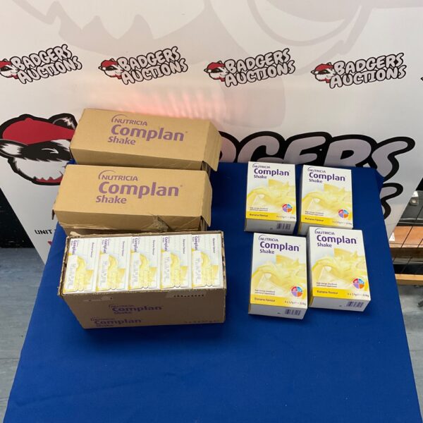 Three boxes of Nutricia Complan banana flavoured shakes.
