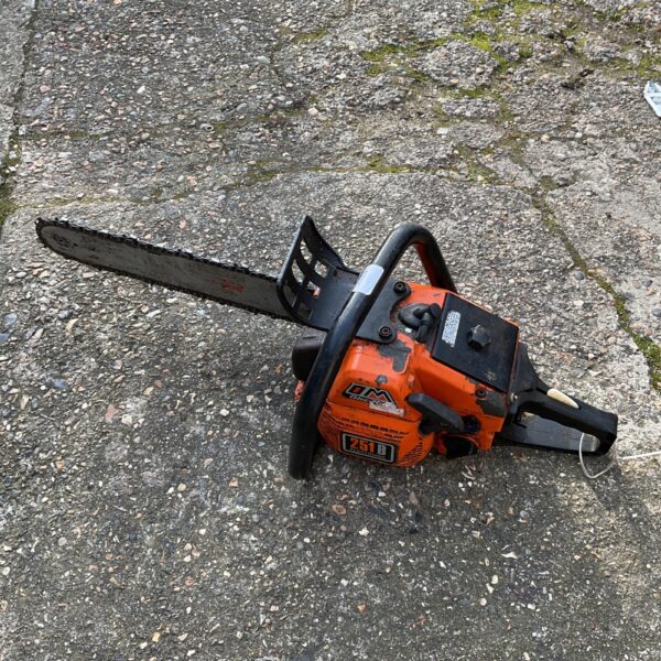 Used Oleo Mac GS270 petrol chainsaw for garden and landscaping tasks.