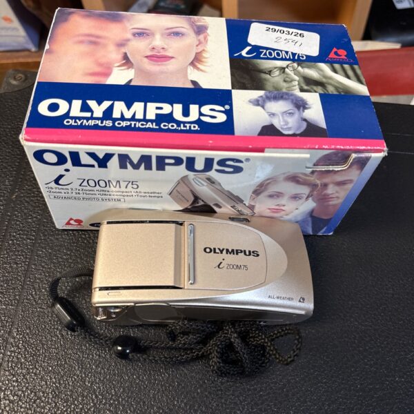 Boxed vintage Olympus Zoom 75 35mm film camera for collectors.