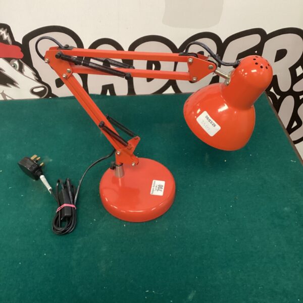 Vibrant orange vintage Anglepoise style desk lamp for task lighting.