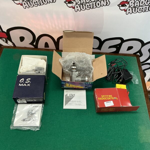 Vintage model engines lot including OS Max and Leo Power.