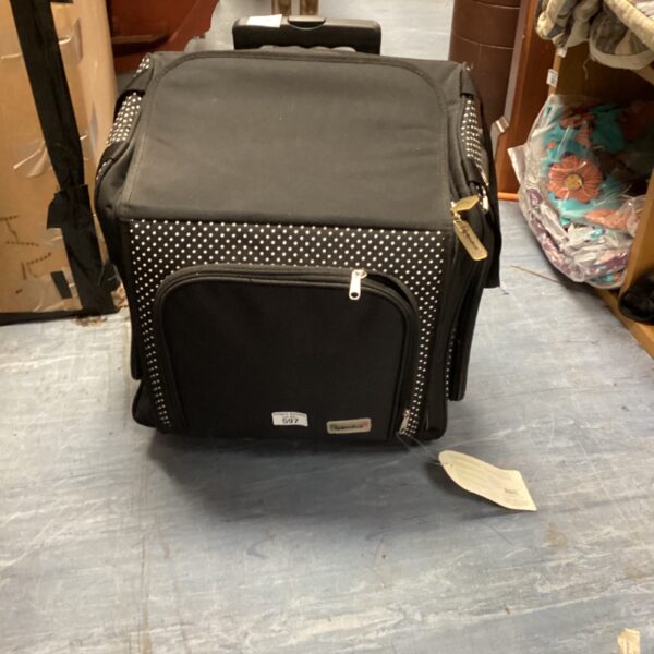 Black and white polka dot Papermani craft tote bag with wheels.