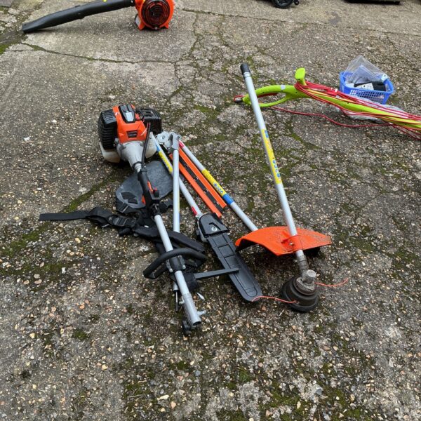 Parker petrol garden multi tool with various attachments for garden maintenance.