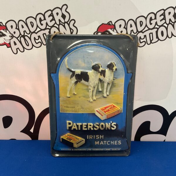 Vintage Patersons Irish Matches tin sign with hunting dog illustration.