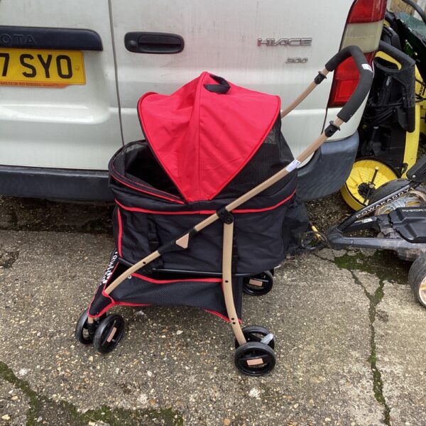 Red and grey Paw Hut dog pram for small pets.