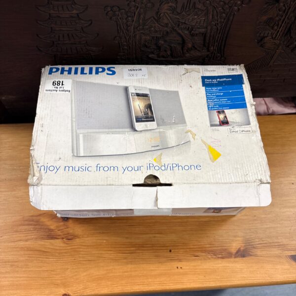 Boxed vintage Philips iPod dock, a retro audio accessory.
