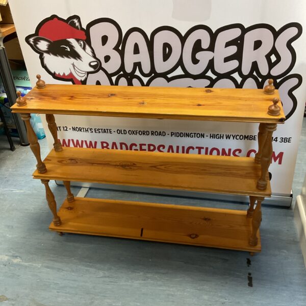 Vintage pine three tier shelf for display and storage.