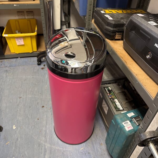 Pink and chrome electric kitchen bin with automatic sensor.