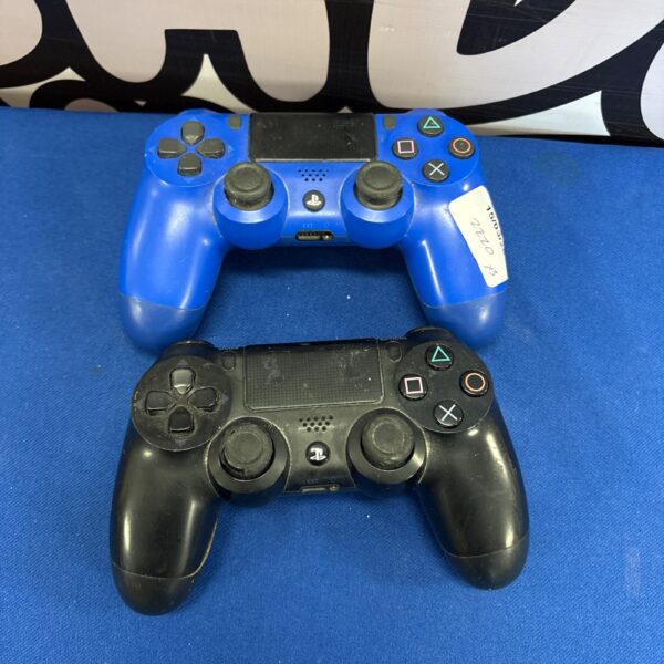 Pair of used Sony PlayStation 4 DualShock 4 controllers for gaming.