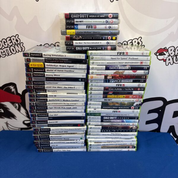 Large collection of PlayStation 3 and Xbox 360 video games for sale.
