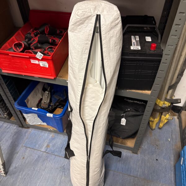 Used pop up gazebo stored in a protective carrying case.