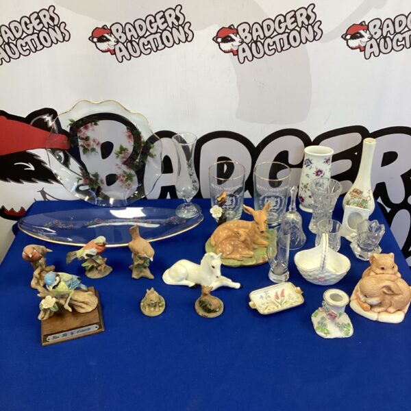 Mixed lot of porcelain and glass animal figures, including birds and rabbits.