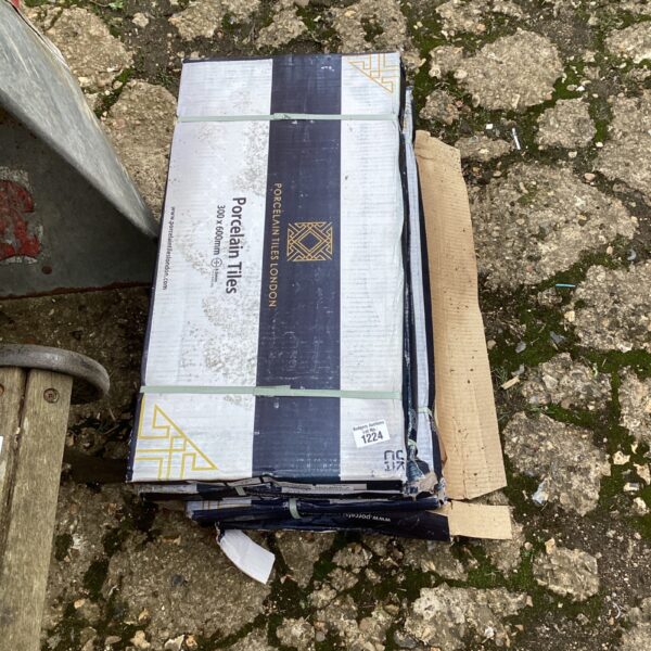 Lot of six packs of 300x600mm porcelain tiles for renovation projects.