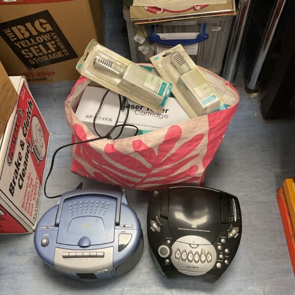 Mixed lot featuring a portable CD radio and vintage audio accessories.