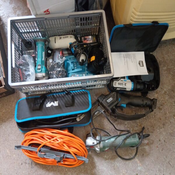 Power tool lot including Makita and McAllister tools.