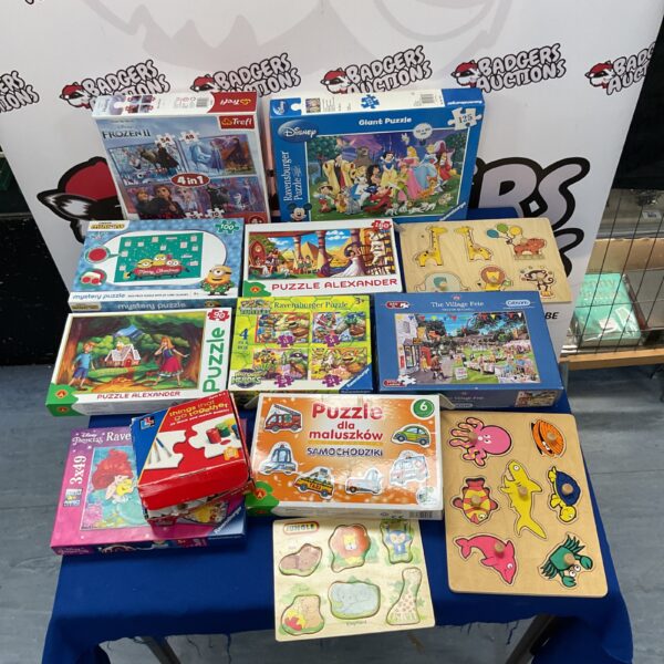Mixed lot of children's puzzles including Disney and Ravensburger.