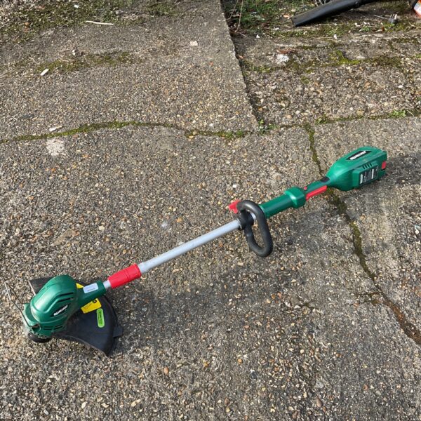 Qualcast cordless grass strimmer in used condition.